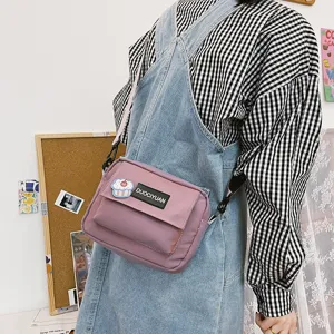 Bolso cruzado de lona morada estilo Harajuku para mujer, bolso casual de estudiante.