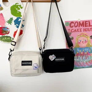 Bolso de hombro de lona estilo Harajuku japonés para mujer, bolso cruzado pequeño y versátil.