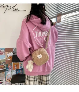 Cute lamb wool crossbody bag featuring a soft plush bear patch and matching bear pendant.