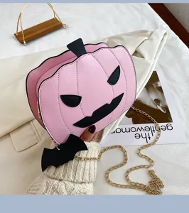 Pink Halloween pumpkin PU leather crossbody bag, cute novelty shoulder purse with chain strap.