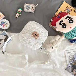 Cute white lamb wool crossbody bag with a lovely bear patch for women, winter daily wear.
