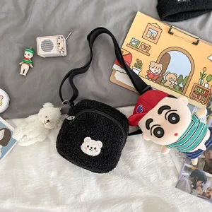 Cute black lamb wool crossbody bag with bear patch and plush doll, vintage Japanese ins style.