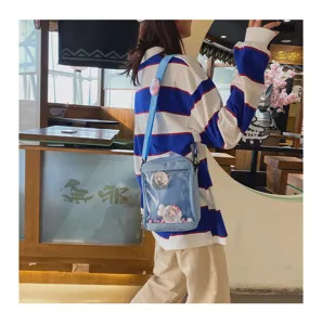 Bolso ita transparente de hombro para estudiantes con ventana y chapas de anime kawaii.