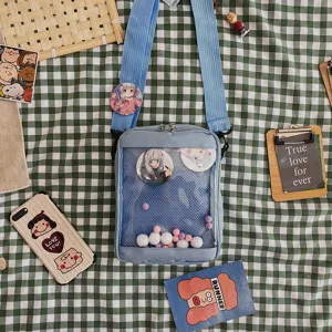 Lindo bolso ita azul de lona bandolera con ventana transparente para pines y insignias anime