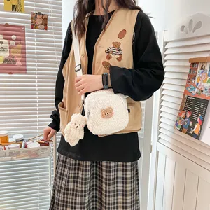 Cute plush bear cross-body bag for women, fluffy sherpa shoulder bag with pendant.