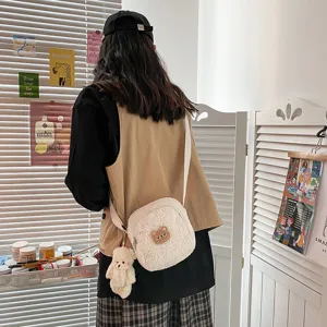 Cute Japanese style fluffy lamb wool crossbody bag with lovely bear pendant for women.