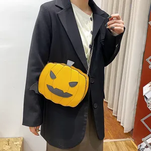 Halloween pumpkin crossbody bag with bat wings and chain strap, stylish PU leather shoulder bag.