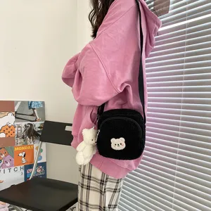 Cute black fluffy bear crossbody bag for women, soft plush sherpa shoulder bag with cute pendant.
