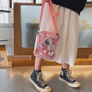 Bolso ita rosa de estilo anime japonés con bolsillo transparente y pines bonitos para estudiantes.