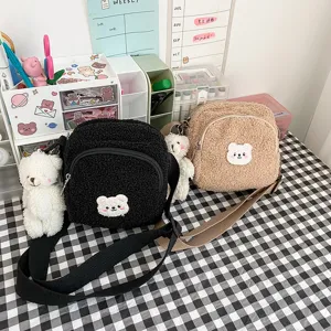Japanese cute lamb wool plush crossbody bag with adorable bear pendant and shoulder strap.