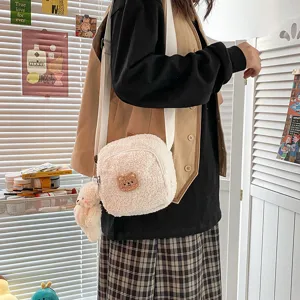 Cute fluffy lamb wool crossbody bag with adorable bear patch and pendant for women daily wear.