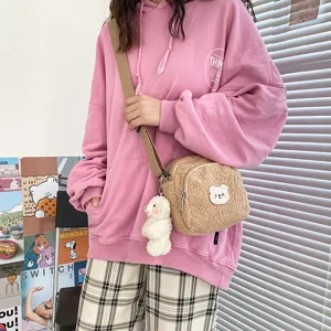 Cute lamb wool crossbody bag for women, fluffy small shoulder bag with cute bear patch.