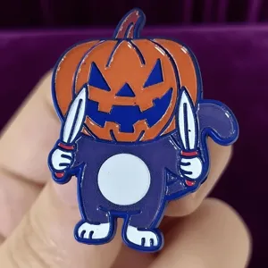 Halloween dark style cat enamel pin detailed close-up shot, trendy quirky cartoon metal brooch badge accessory.