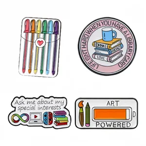 Cute enamel pin set featuring book, pen, art and reading themes for stylish bags and clothing.