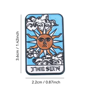 Close-up detail of tarot sun enamel pin, vintage badge design with clear lines and vibrant colors.