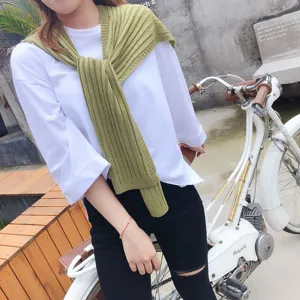 Detailed view of a stylish Korean style knitted shawl, perfect for autumn fashion.
