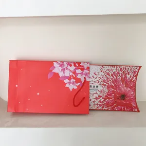 Silk scarf gift packaging set featuring a red floral paper bag and pillow gift box.