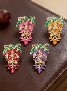 Close-up detail showcasing the sparkling crystal rhinestone multi-color wisteria flower brooches.