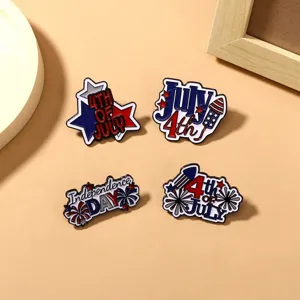 Detailed close-up of four American Independence Day enamel pins with patriotic designs.