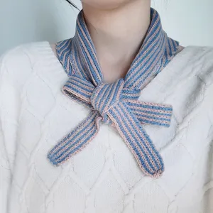 Close-up detail of a knitted striped neck scarf, soft texture, stylish accessory for winter.
