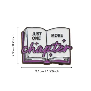 Metal enamel pin shaped like an open book with book lover quote, 2.3x3.1cm decorative badge.