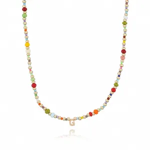 Bohemian colorful seed bead necklace with gold metal beads and letter G pendant for women.