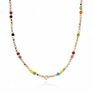 Bohemian colorful rice bead beaded necklace with letter J pendant for women fashion jewelry detail.