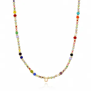 Bohemian colorful seed bead necklace with gold beads and letter O pendant for women.