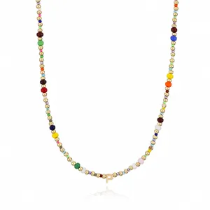 Detailed close-up shot of Bohemian colorful rice bead necklace featuring letter P pendant.