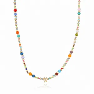 Bohemian colorful seed beaded necklace with gold letter X pendant for women fashion.