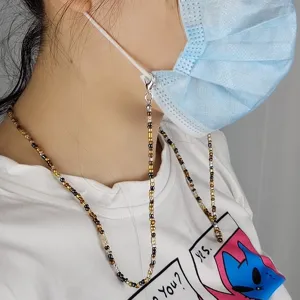 Detailed close-up of colorful beaded mask chain and glasses holder, handmade multi-use fashion accessory.
