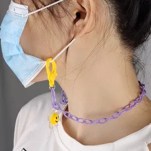 Close-up detail of the colorful acrylic flower mask chain, cute anti-loss lanyard accessory for kids.