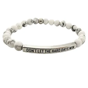 Bracciale con perline in pietra naturale e tubo in acciaio inossidabile inciso utile.