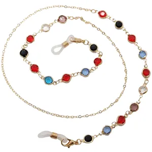 Chaine de lunettes en strass colores et porte masque elegant bijou en metal dore mode.