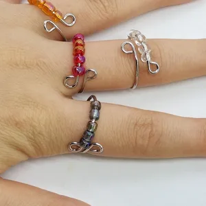 Anello antistress in acciaio inossidabile con perline colorate, anello girevole ansia dettagli.