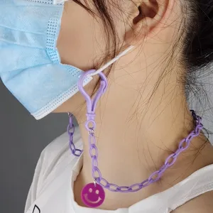 Acrylic purple smiley face mask chain lanyard, stylish neck hanging accessory for women daily wear.