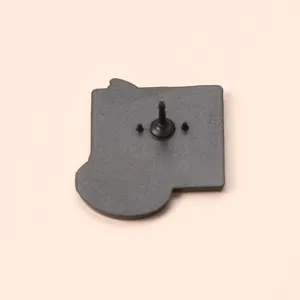Metal enamel pin back detail showing secure attachment pin and sturdy metal construction.
