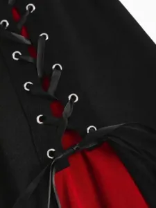 Gothic two-tone lace-up A-line skirt detail with metal eyelets and satin ribbons