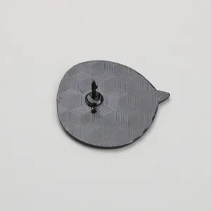 Detail shot showing the metal pin back and sturdy clutch fastening of the stylish brooch.