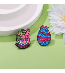 Detailed shot of Easter theme enamel brooches with colorful designs and English text pins.