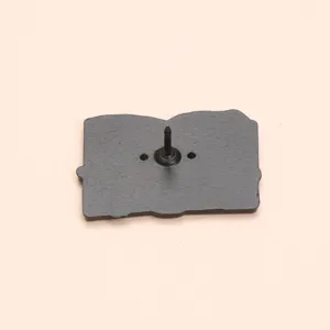 Detailed back view of the creative book shaped metal enamel pin showing secure metal clutch.
