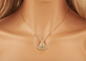 Gold plated hollow geometric cross pendant necklace detail view fashion jewelry accessory