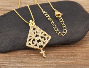 Gold plated geometric hollow cross necklace with sparkling zircon stones for fashion style.