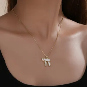 Gold Hebrew Chai symbol necklace with white mother of pearl pendant for women fashion jewelry.