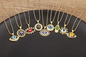 Detail view of 9-style gold-plated evil eye pendant necklaces with micro-set cubic zirconia.
