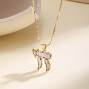 Gold-plated Hebrew Chai symbol necklace with mother of pearl inlay and delicate beaded chain.