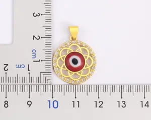 18K gold plated evil eye pendant with cubic zirconia, hollow geometric Turkish blue eye design.