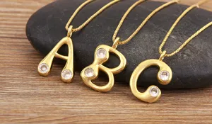18k gold plated letter A B C pendant necklace with sparkling micro-inlaid cubic zirconia.