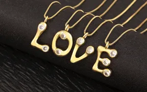 Detail of gold-plated letter LOVE pendant necklaces set with sparkling cubic zirconia.