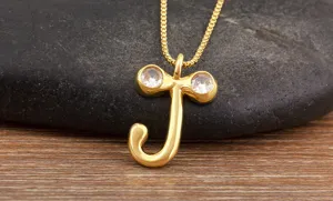 Exquisite 18K gold plated letter J necklace detail featuring sparkling cubic zirconia stones.
